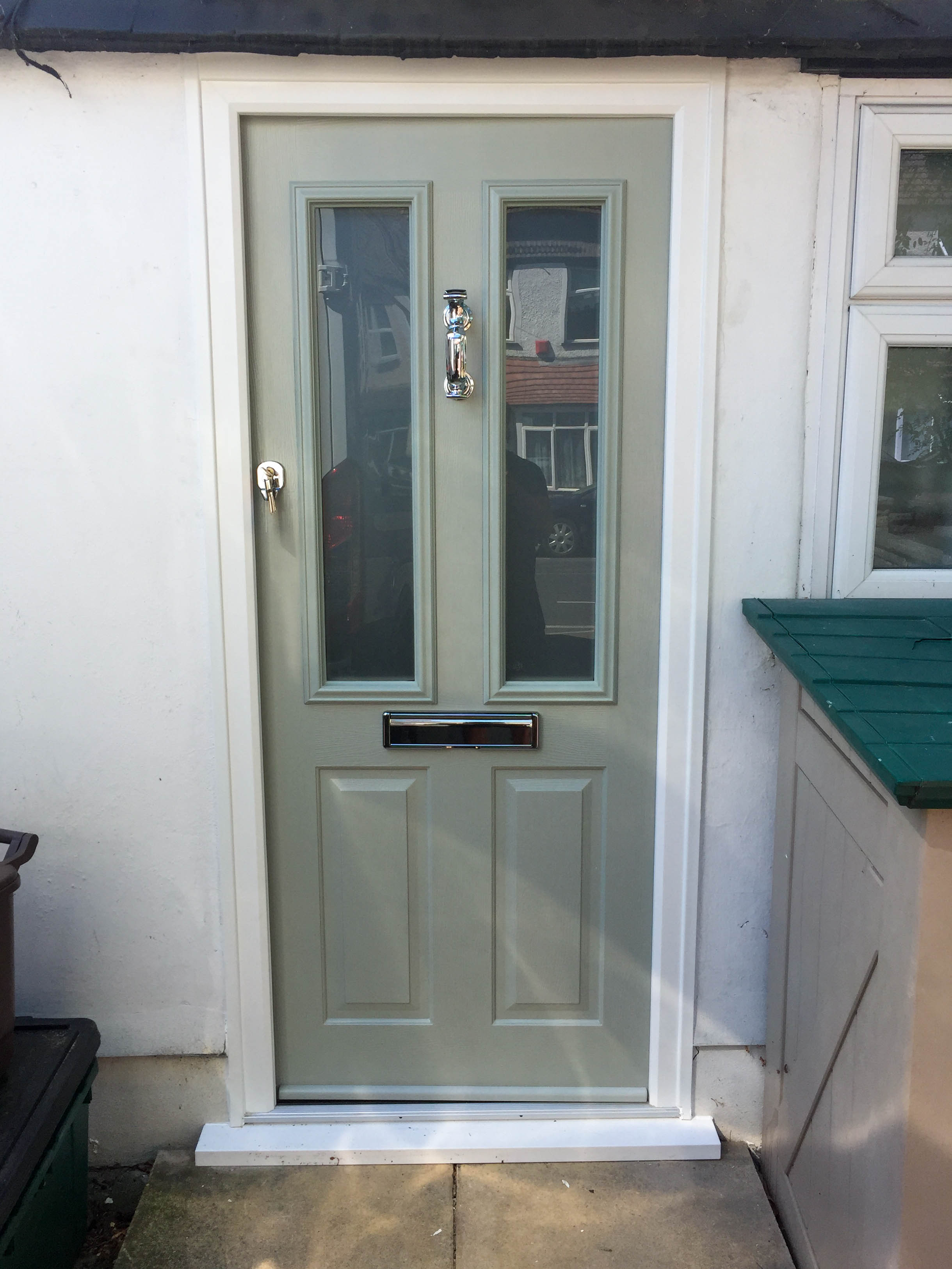 Solidor Composite Front Door SCI WIndows in Morden, Surrey